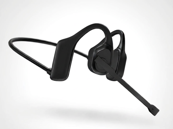 Black bone-style over-ear headphones with an attached boom microphone, shown floating against a clean light gray background.